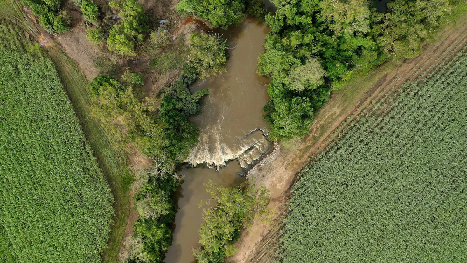 An overhead shot of water flowing and the rock formation for fish passage